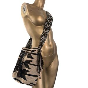 Tribal Artisan woven bucket bag with wide shoulder/cross-body strap + tassels